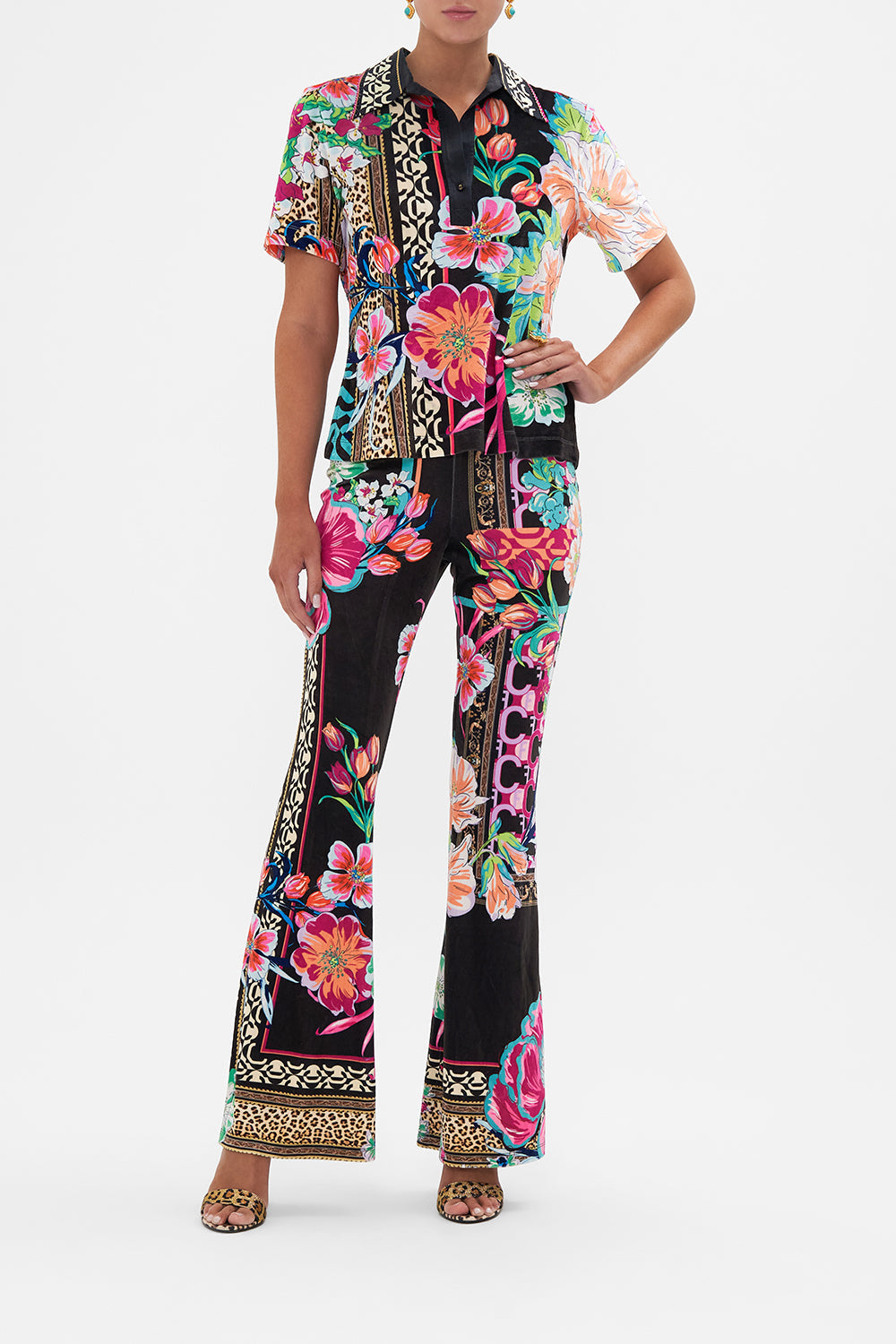 Front view of model wearing CAMILLA printed floral pants in Printed Prima Vera print