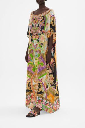 Side view of model wearing CAMILLA silk kaftan in Sundowner in Sicily print 