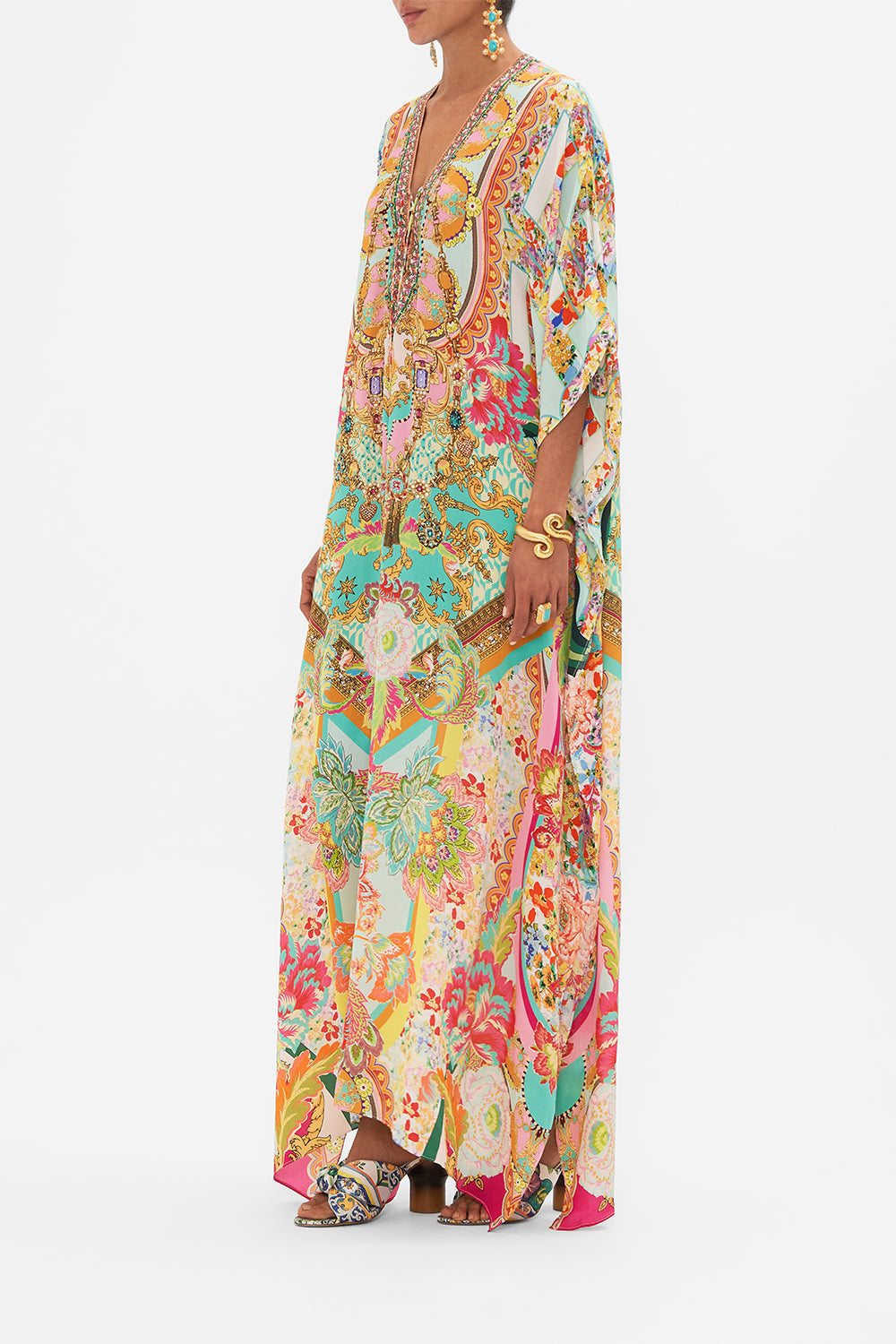 Side view of model wearing CAMILLA silk printed kaftan in An Italian Welcome print