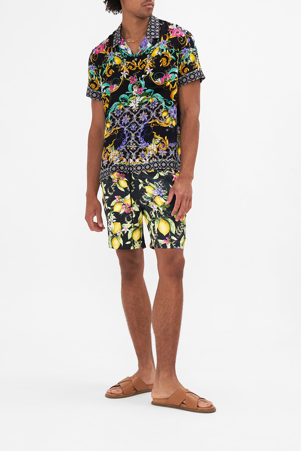 Front view of model wearing HOTEL FRANKS BY CAMILLA mens short sleeve floral shirt in Meet Me In Marchesa print