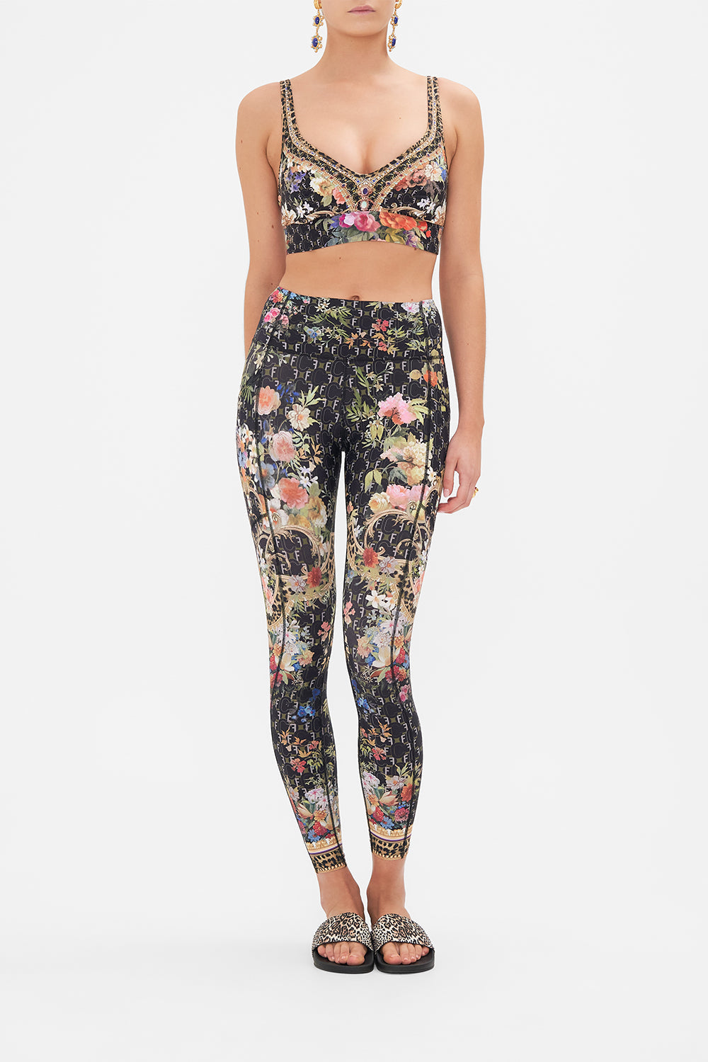 Front view of model wearing  CAMILLA active wear crop top in A Gift from the Baron print