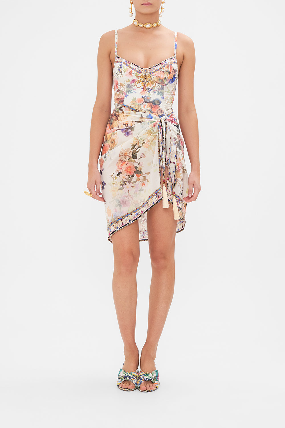 Front view of model wearing CAMILLA resortwear short sarong in Friends with Frescos print