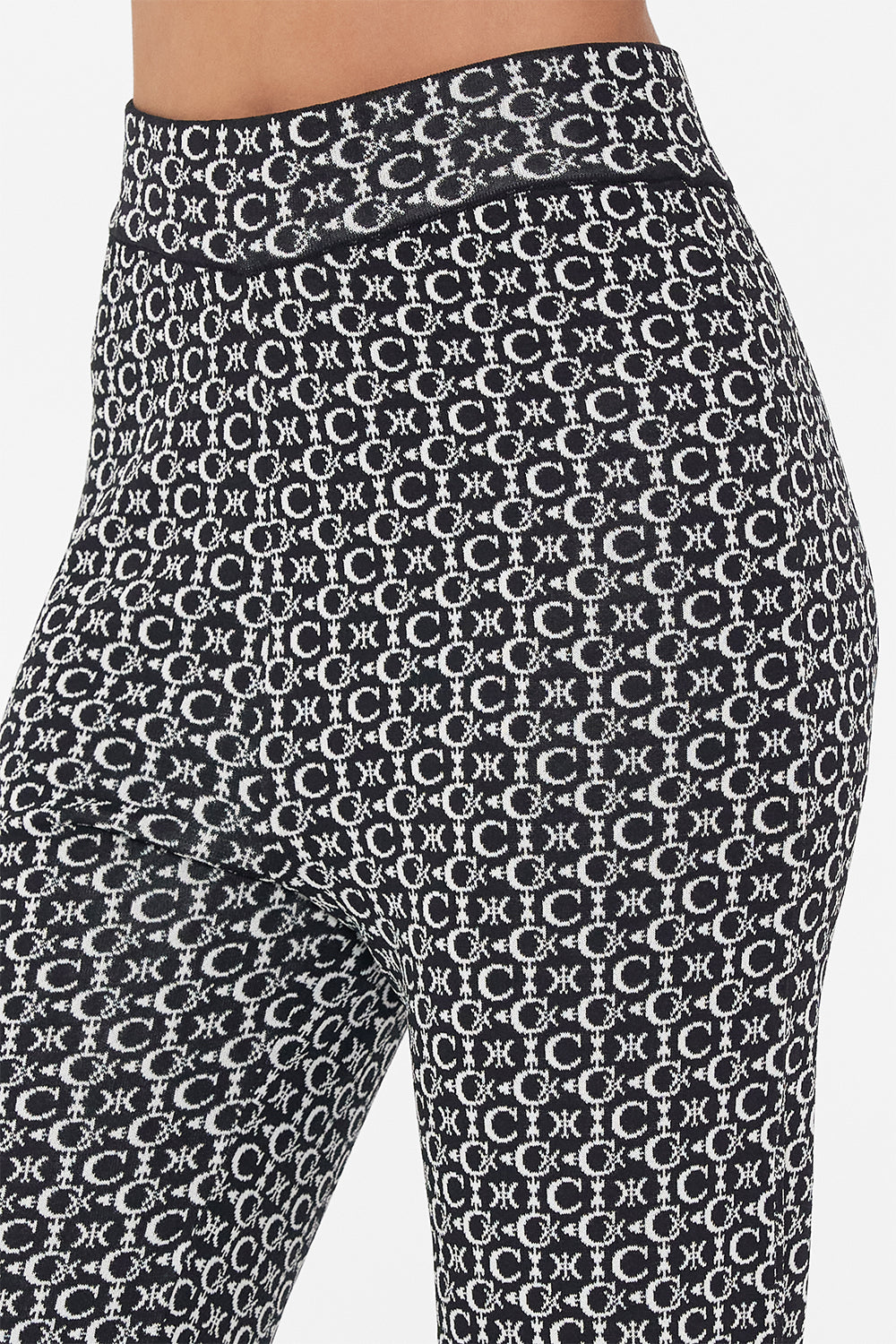 Detail view of model wearing CAMILLA silk shirt in Song Of Sacrifice print