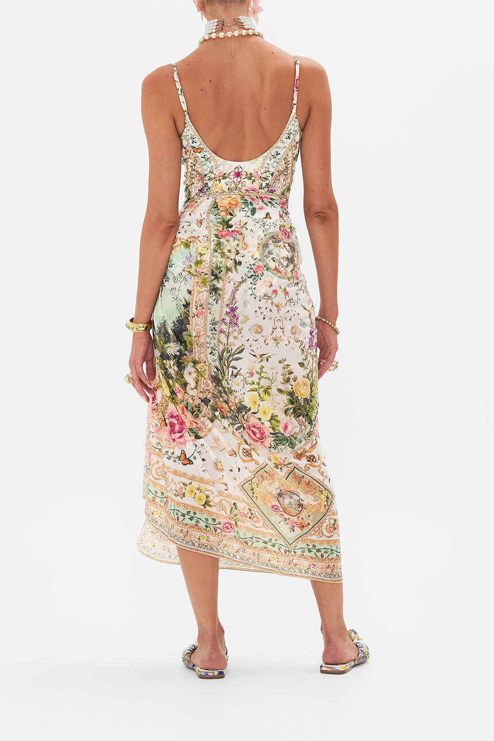 Back view of model wearing CAMILLA resortwear long sarong in Renaissance Romance print