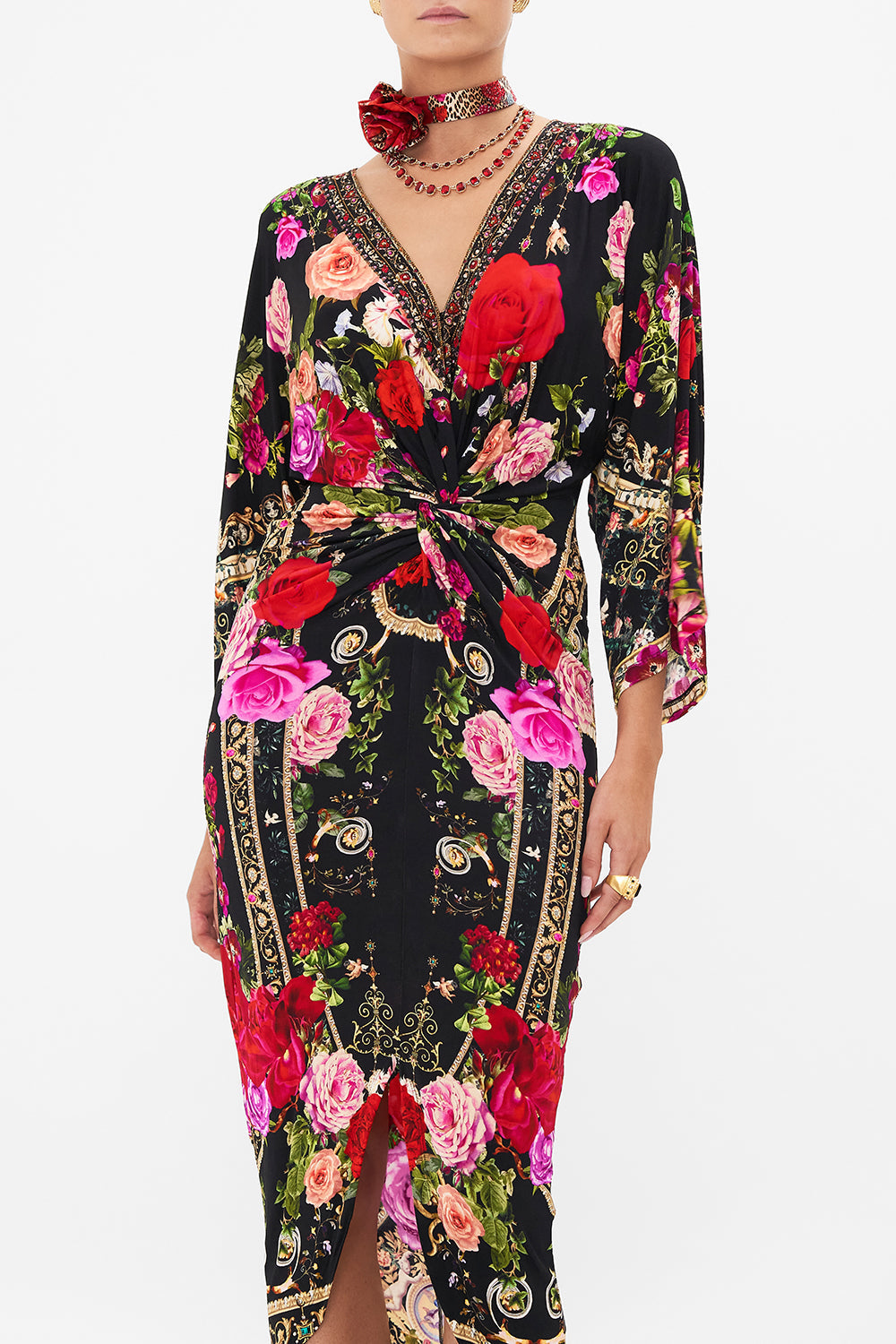 Crop view of model wearing CAMILLA jersey dress in Reservation For Love print