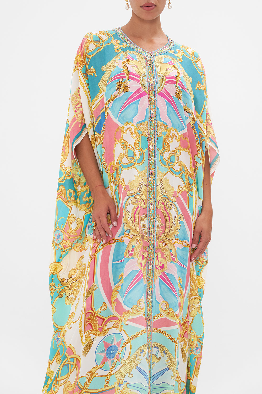 Crop view of model wearing CAMILLA silk kaftan in Sail Away With Me print 