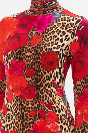 Detail view of model wearing CAMILLA jersey turtleneck in Heart Like A Wildflower print