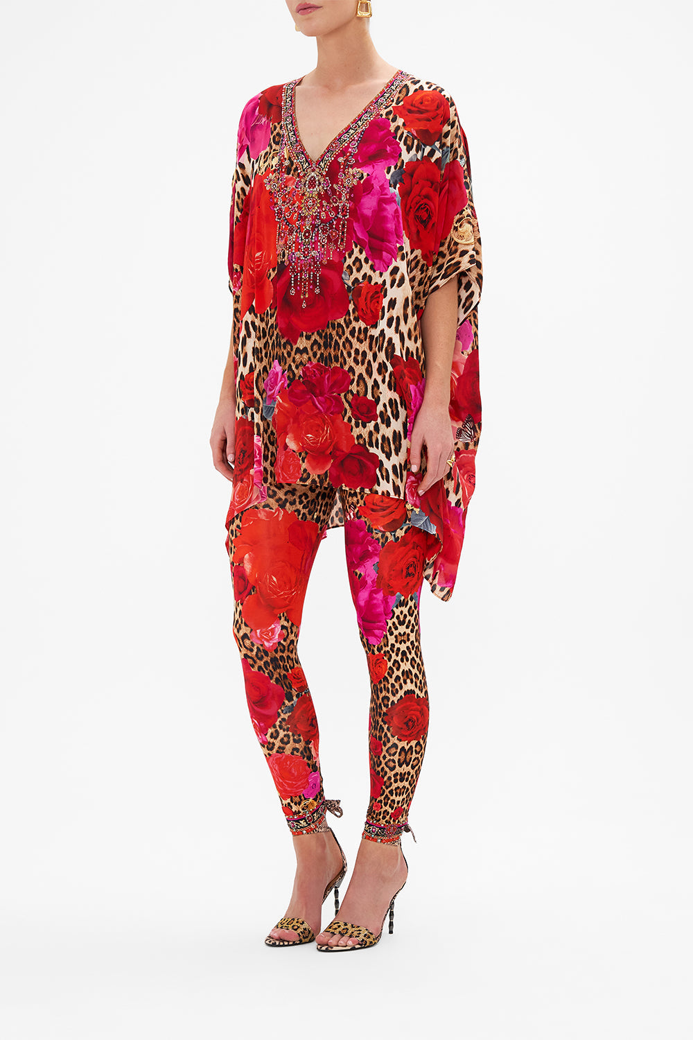 Side view of model wearing CAMILLA designer leggings in Heart Like A Wildflower print 