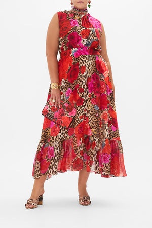 Front view of curvy model wearing CAMILLA plus size silk maxi dress in Heart Like A Wildflower print