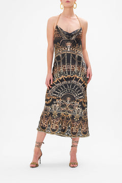 Front view of model wearing CAMILLA silk halter dress in Masked At Moonlight print