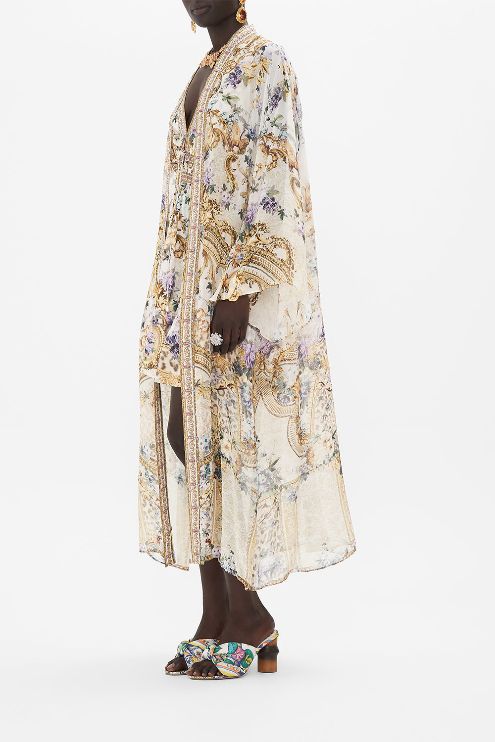 Side view of model wearing CAMILLA silk robe in Palazzo Playdate print 