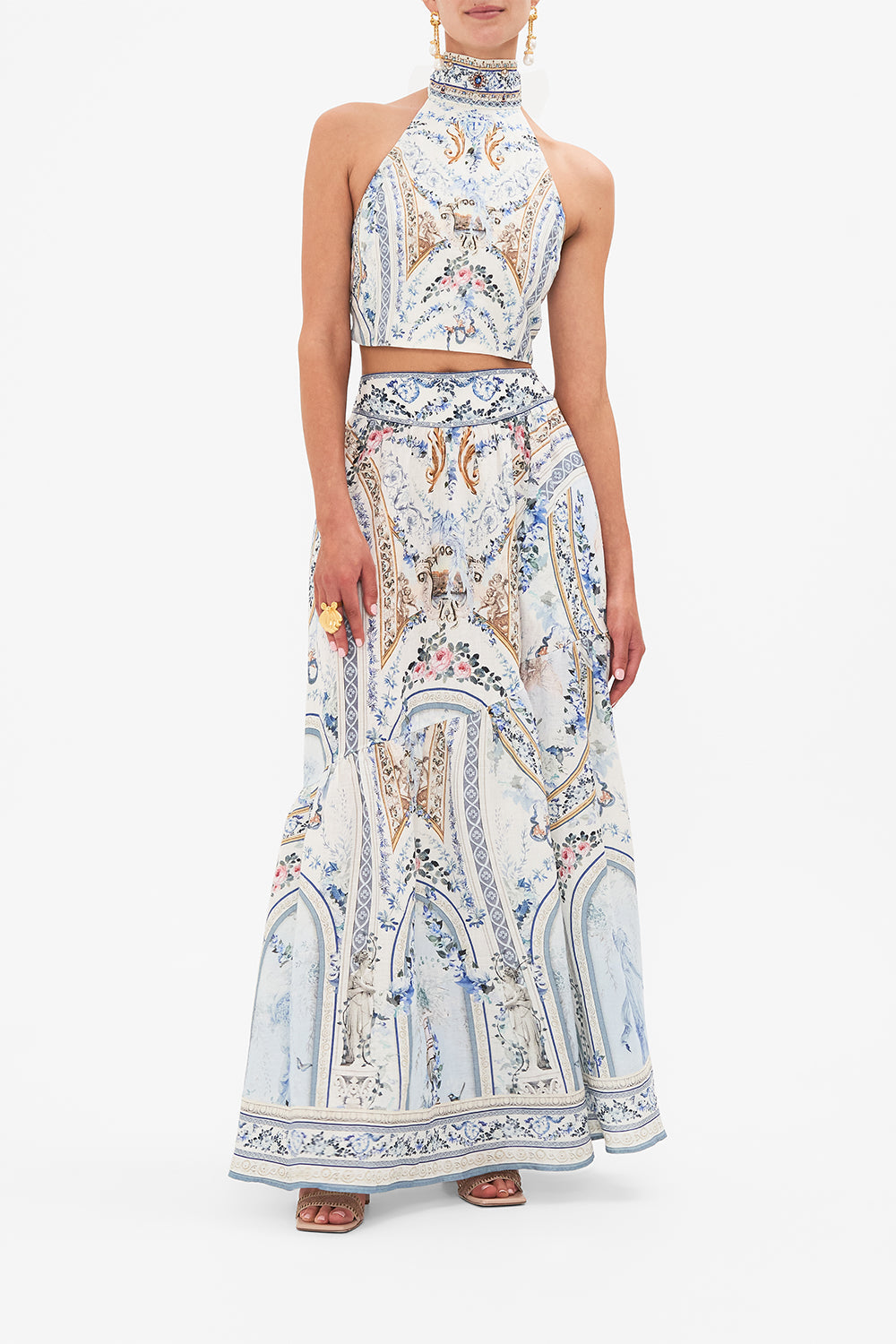 Front view of model wearing CAMILLA designer halter top in Season of The Siren print 