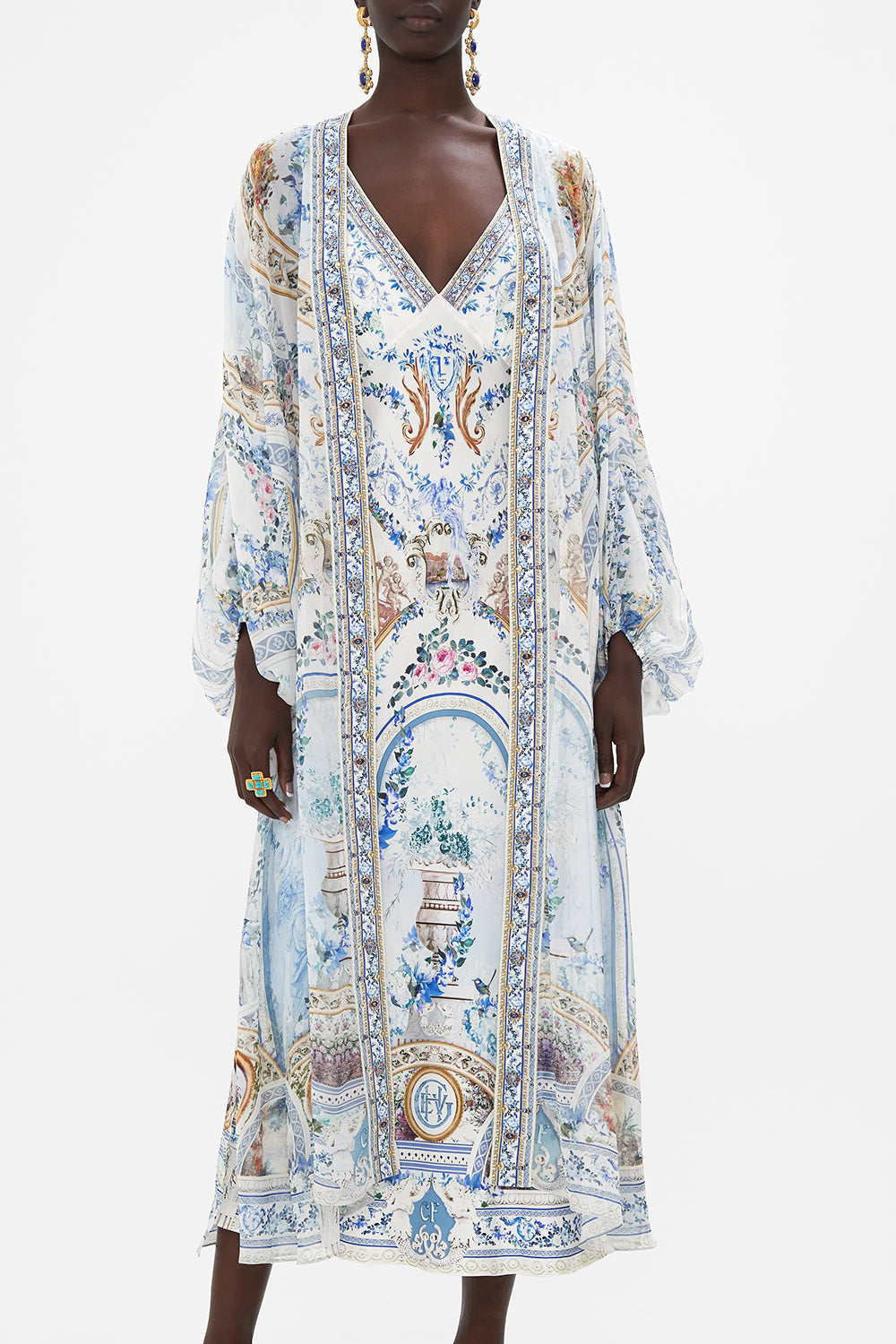 Crop view of model wearing CAMILLA silk jacket in Season Of The Sirenprint 