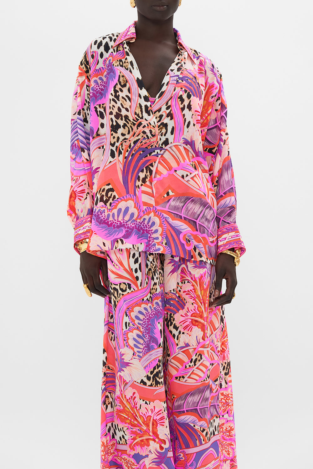 Crop view of model wearing CAMILLA silk shirt in Viola Vintage print