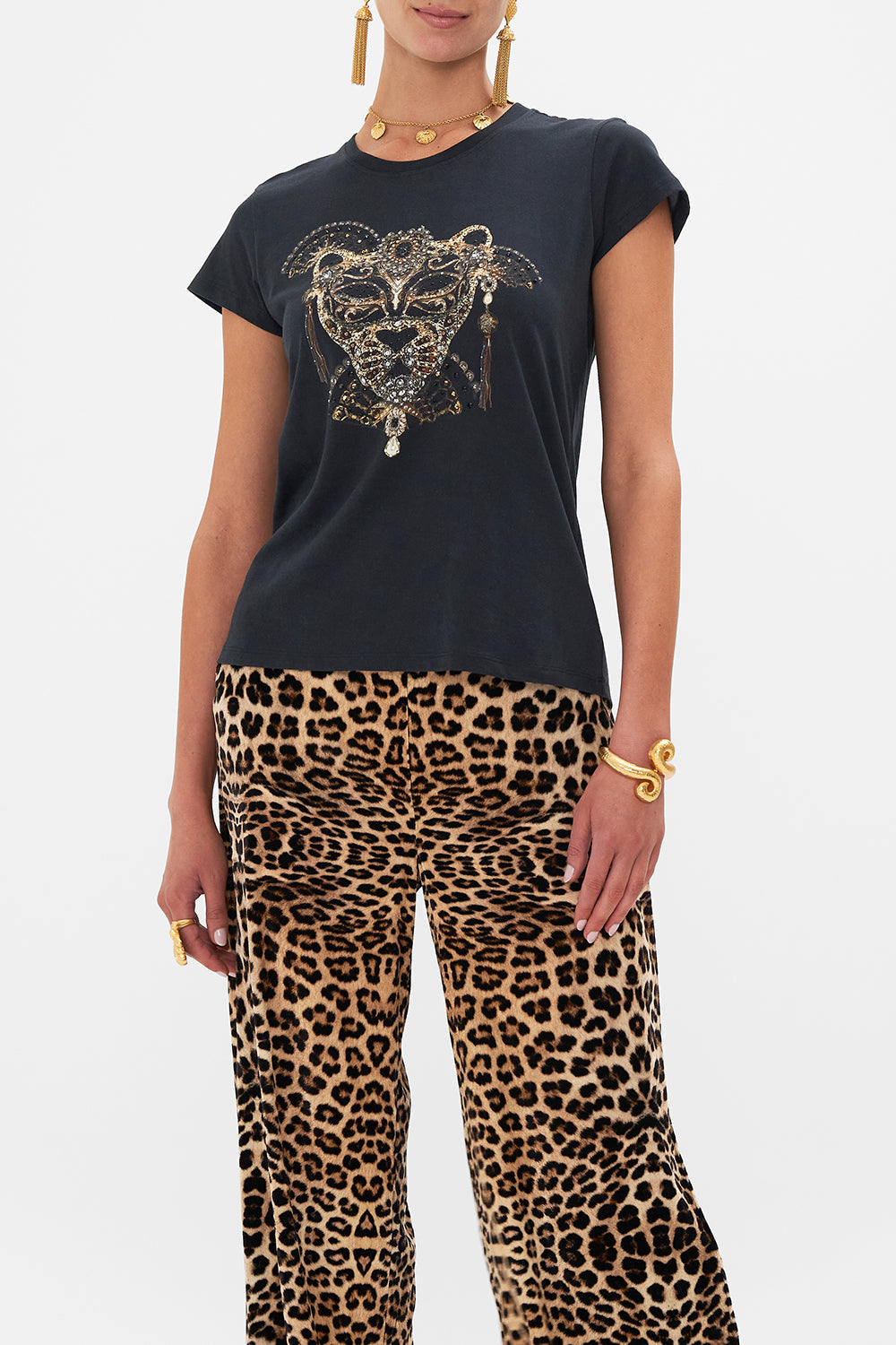 Crop view of model wearing CAMILLA luxury t shirt in Masked At Moonlight print
