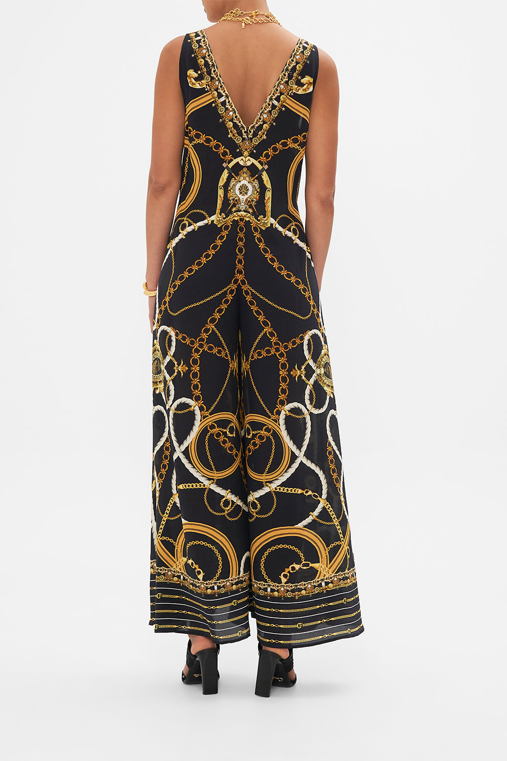 Back view of model wearing CAMILLA silk jumpsuit in Coast to Coast print