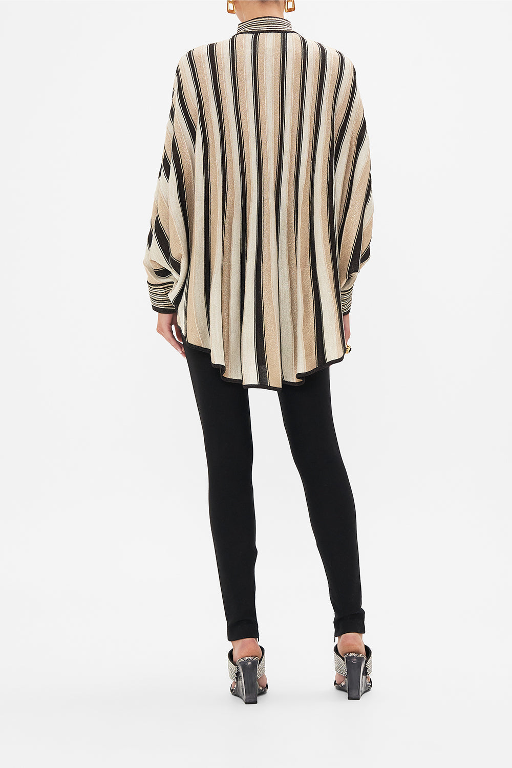 Back view of model wearing CAMILLA luxury knit in Soul Of A Star Gazer print