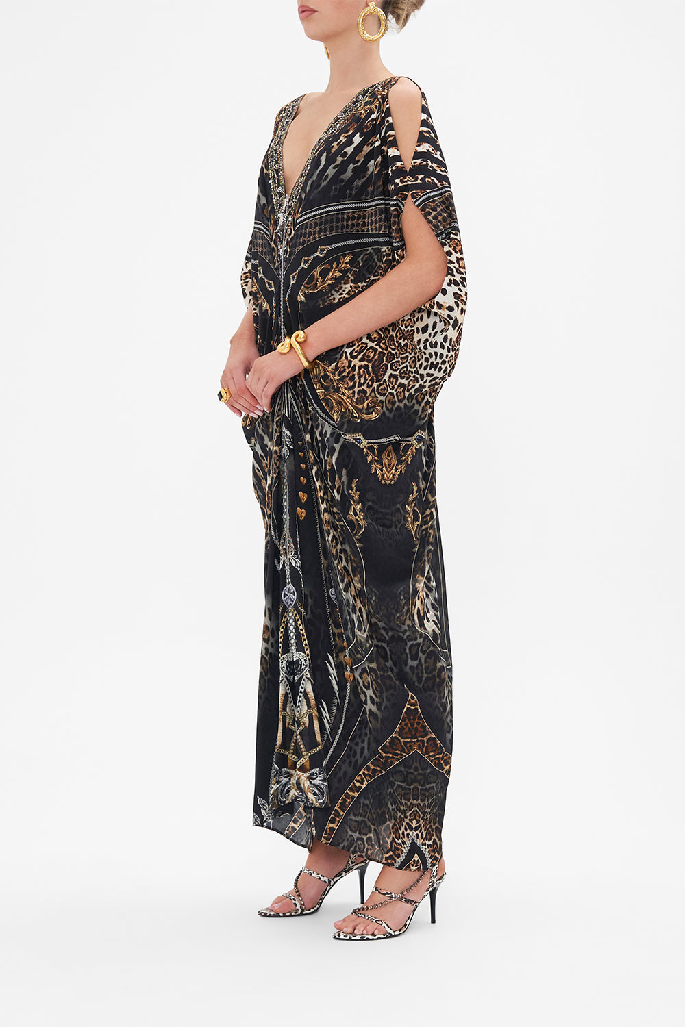 Side view of model wearing CAMILLA silk maxi dress Chaos In The Cosmos animal print