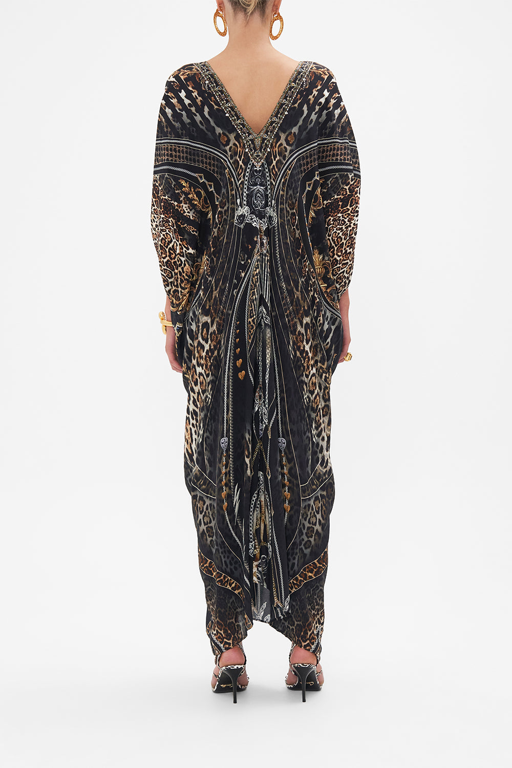 Back view of model wearing CAMILLA silk maxi dress Chaos In The Cosmos animal print