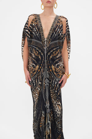 Crop view of model wearing CAMILLA silk maxi dress Chaos In The Cosmos animal print