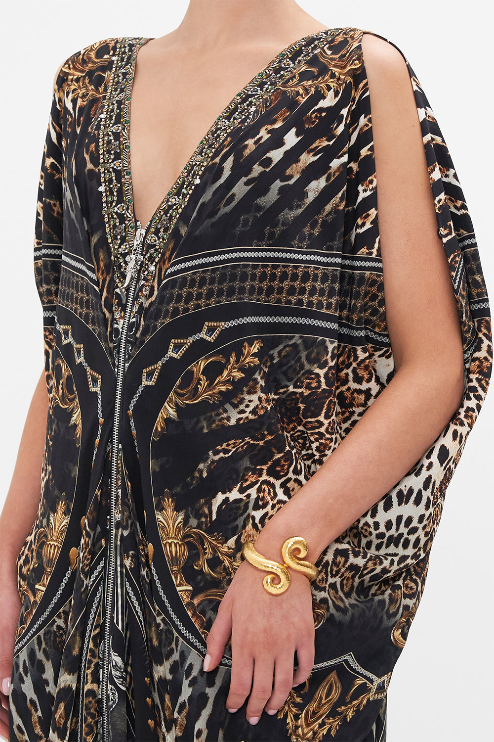 Angled detail view of model wearing CAMILLA silk maxi dress Chaos In The Cosmos animal print