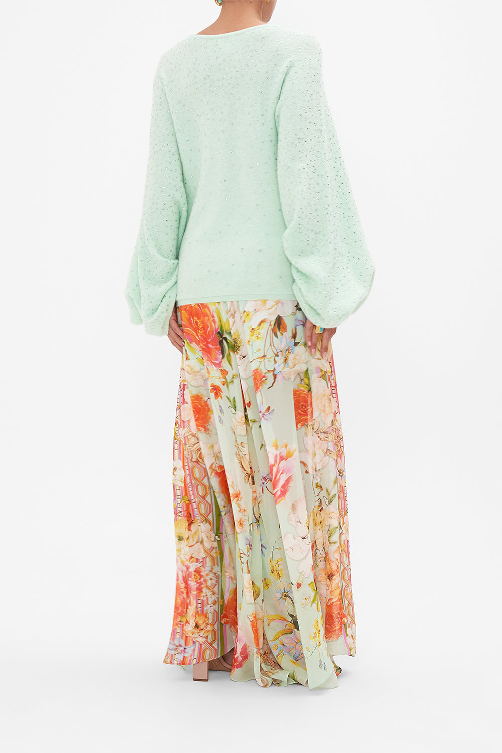 Back view of model wearing CAMILLA v neck knit jumper in mint 