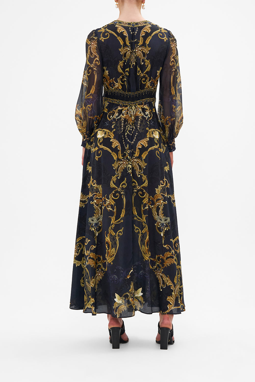 Back view of model wearing CAMILLA silk maxi dress in Moonlight Melodies print