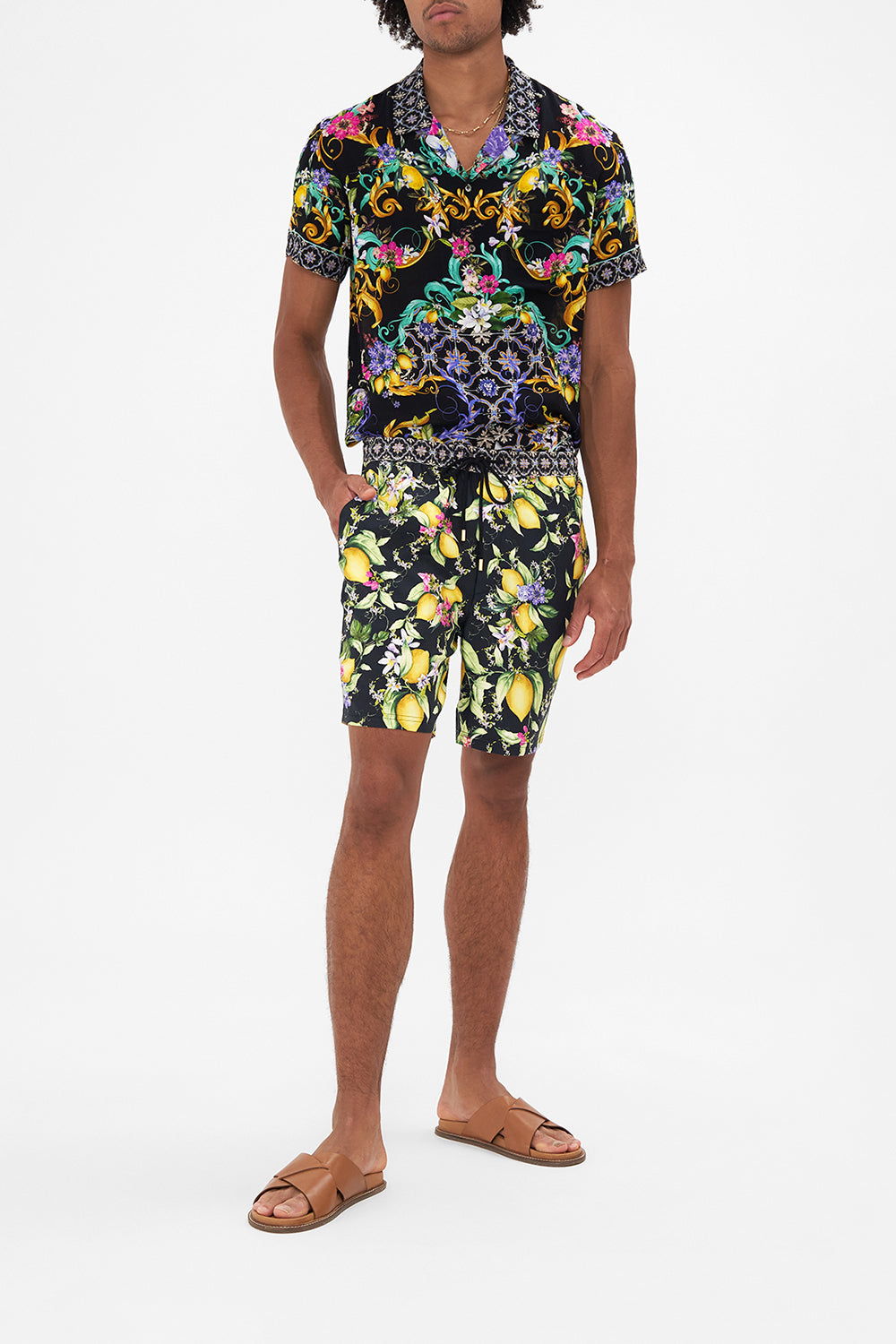 Front view of model wearing HOTEL FRANKS BY CAMILLA floral mens short in Meet Me In Marchesa print