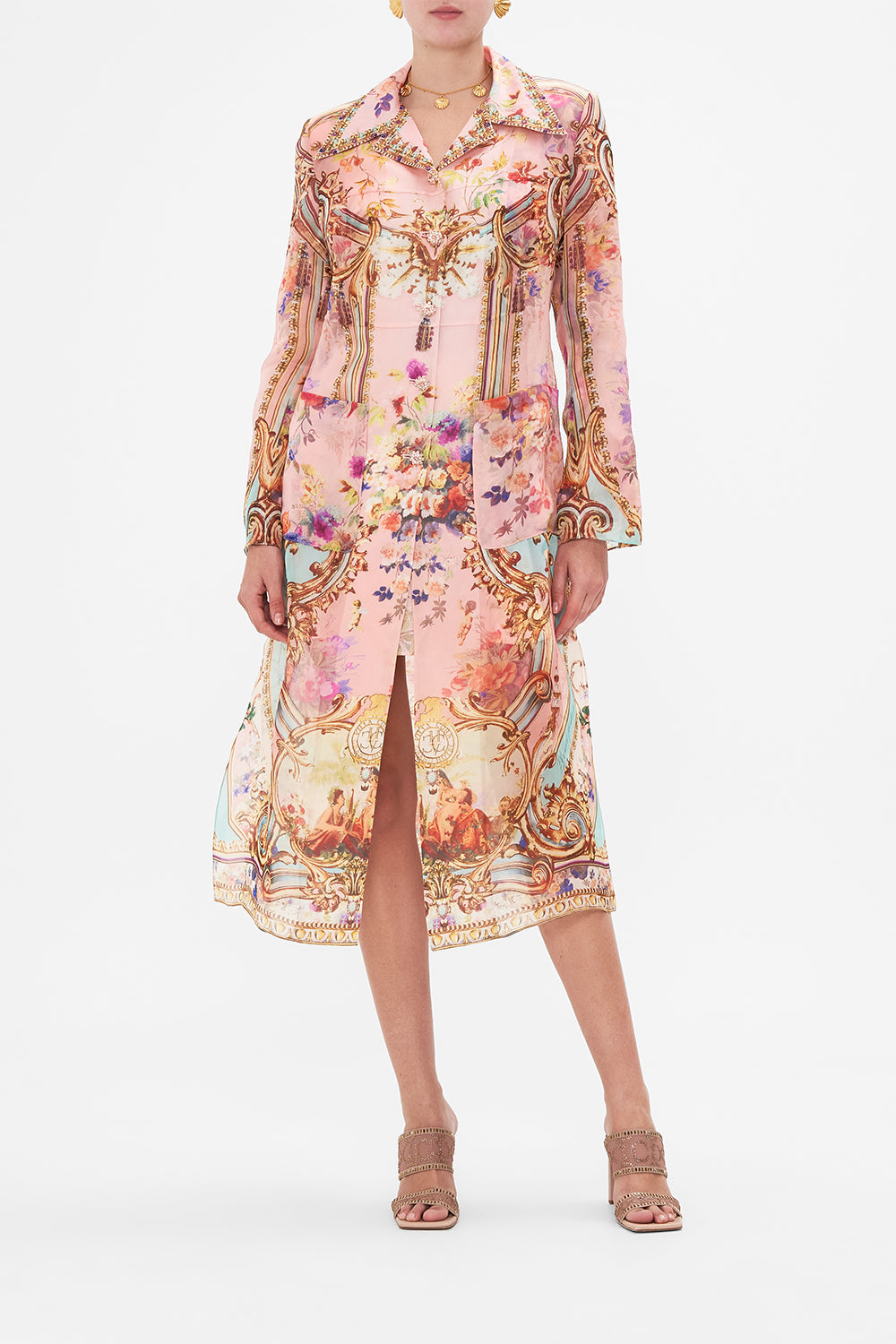 Front view of model wearing CAMILLA long pink silk coat in Letters From The Pink Room print