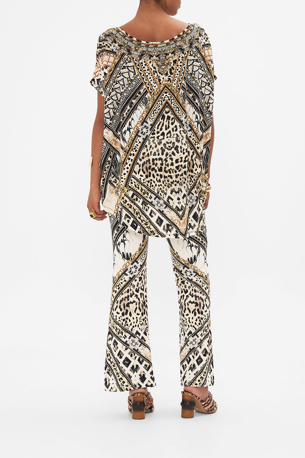 Back view of model wearing CAMILLA animal print tee in Mosaic Muse