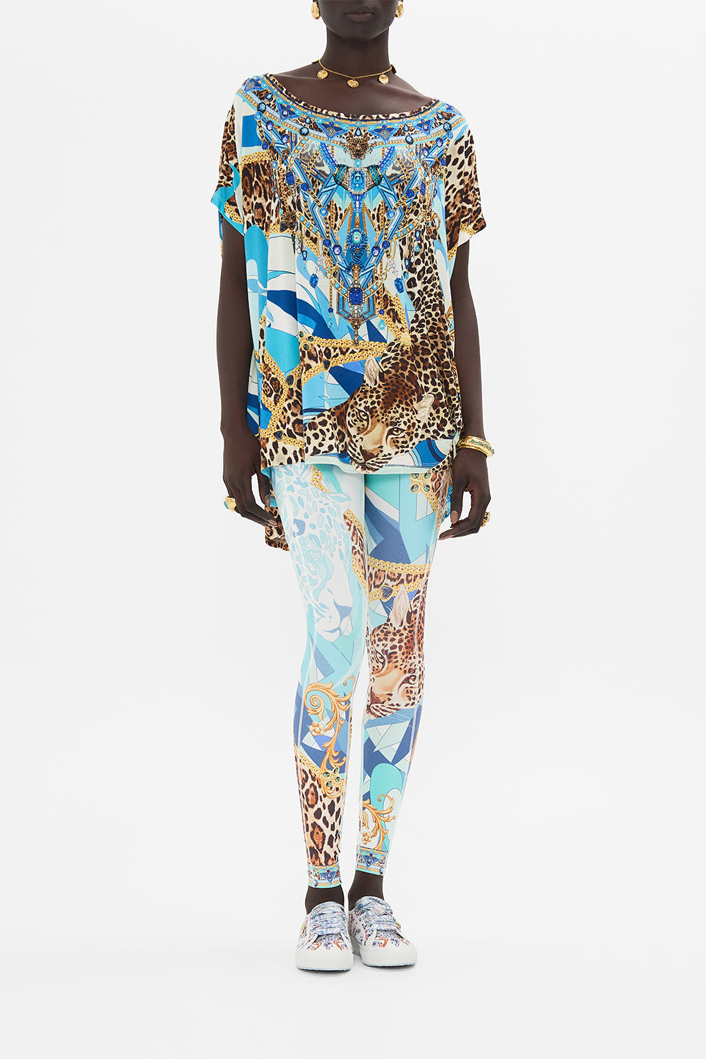 Front view of model wearing CAMILLA designer t shirt in Sky Cheetah print 