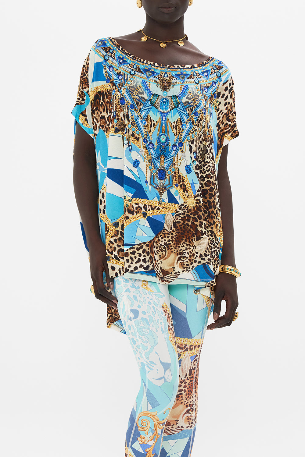Crop view of model wearing CAMILLA designer t shirt in Sky Cheetah print 