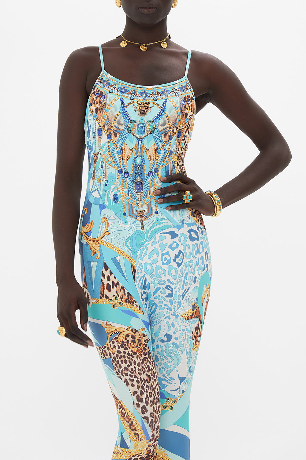 Crop view of model wearing CAMILLA designer catsuit in Sky Cheetah print