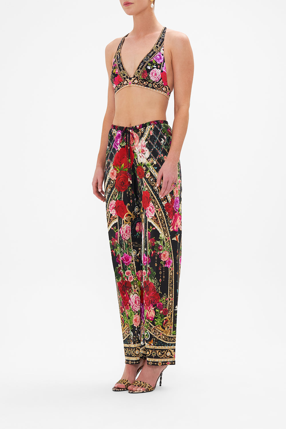 Side view of model wearing CAMILLA long sarong in Season Of The Siren print 