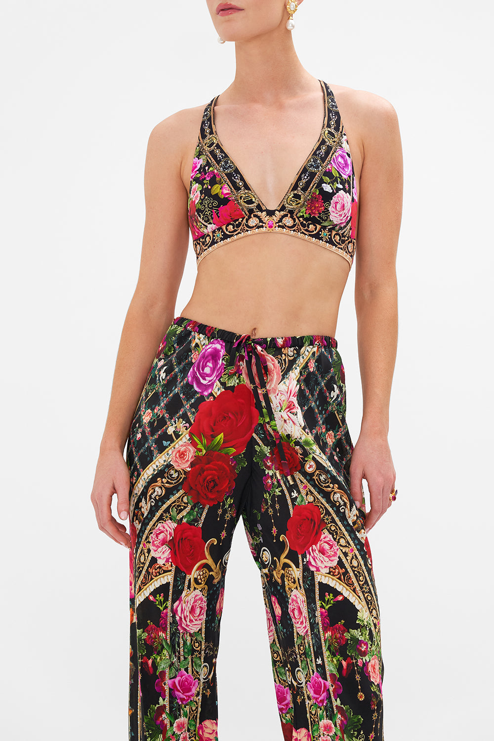 Crop view of model wearing CAMILLA long sarong in Season Of The Siren print 