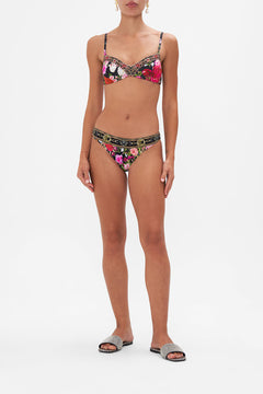 Front view of model  wearing CAMILLA lingerie brief in Reservation for Love print 