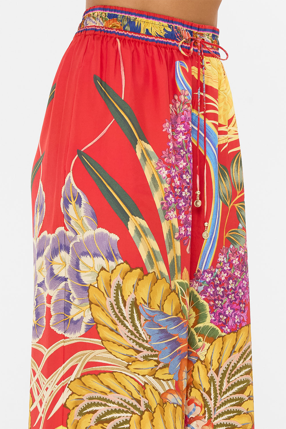 The CAMILLA BLOUSON SLEEVE LAYER ROSE GARDEN REVOLUTION in our  print.