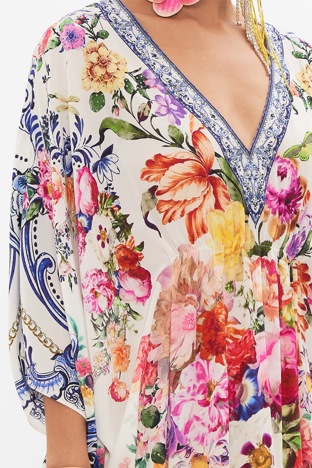 Detail view of model wearing CAMILLA silk kaftan in Dutch Is Life print