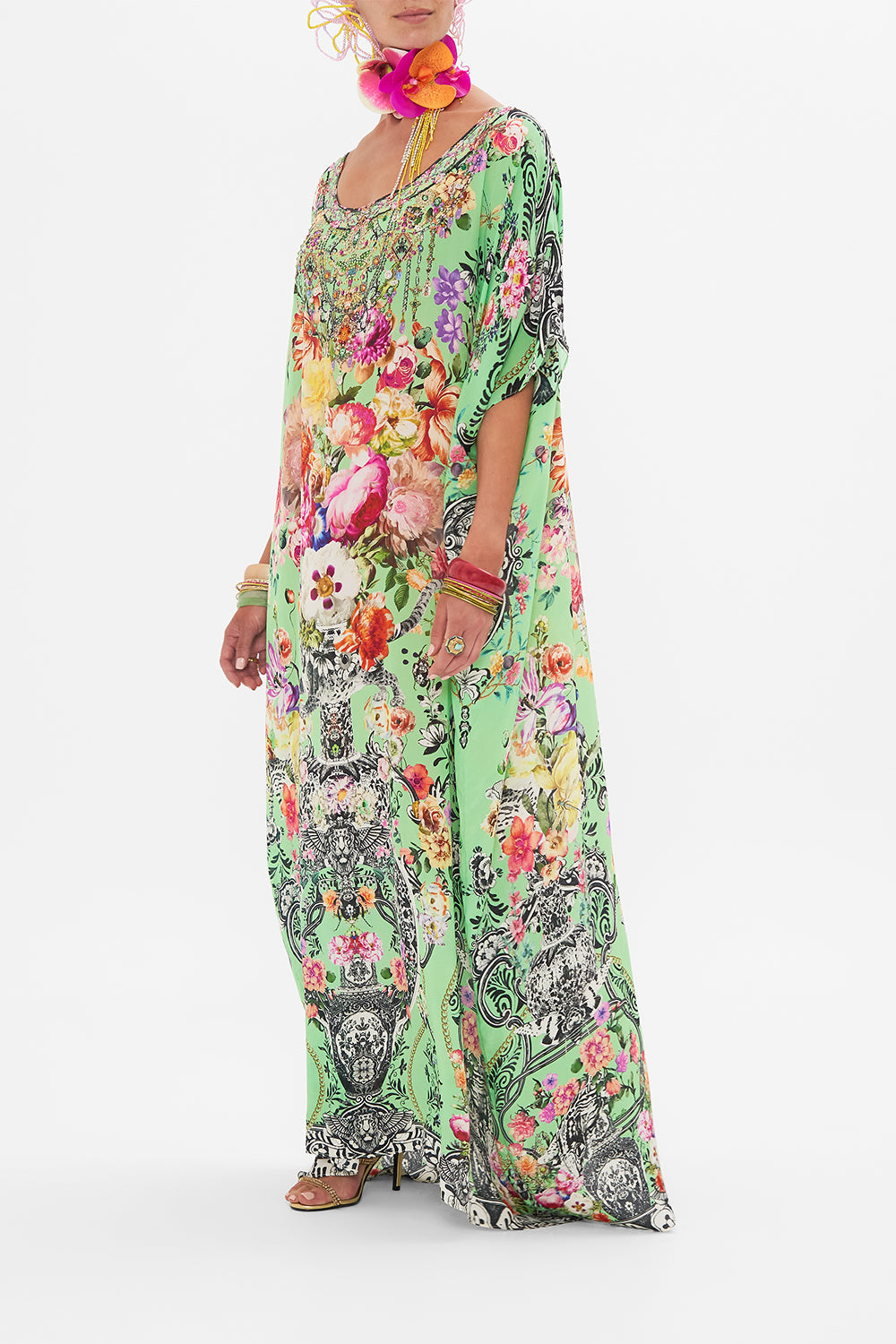 Side view of model wearing CAMILLA silk kaftan in Porcelain Dream print