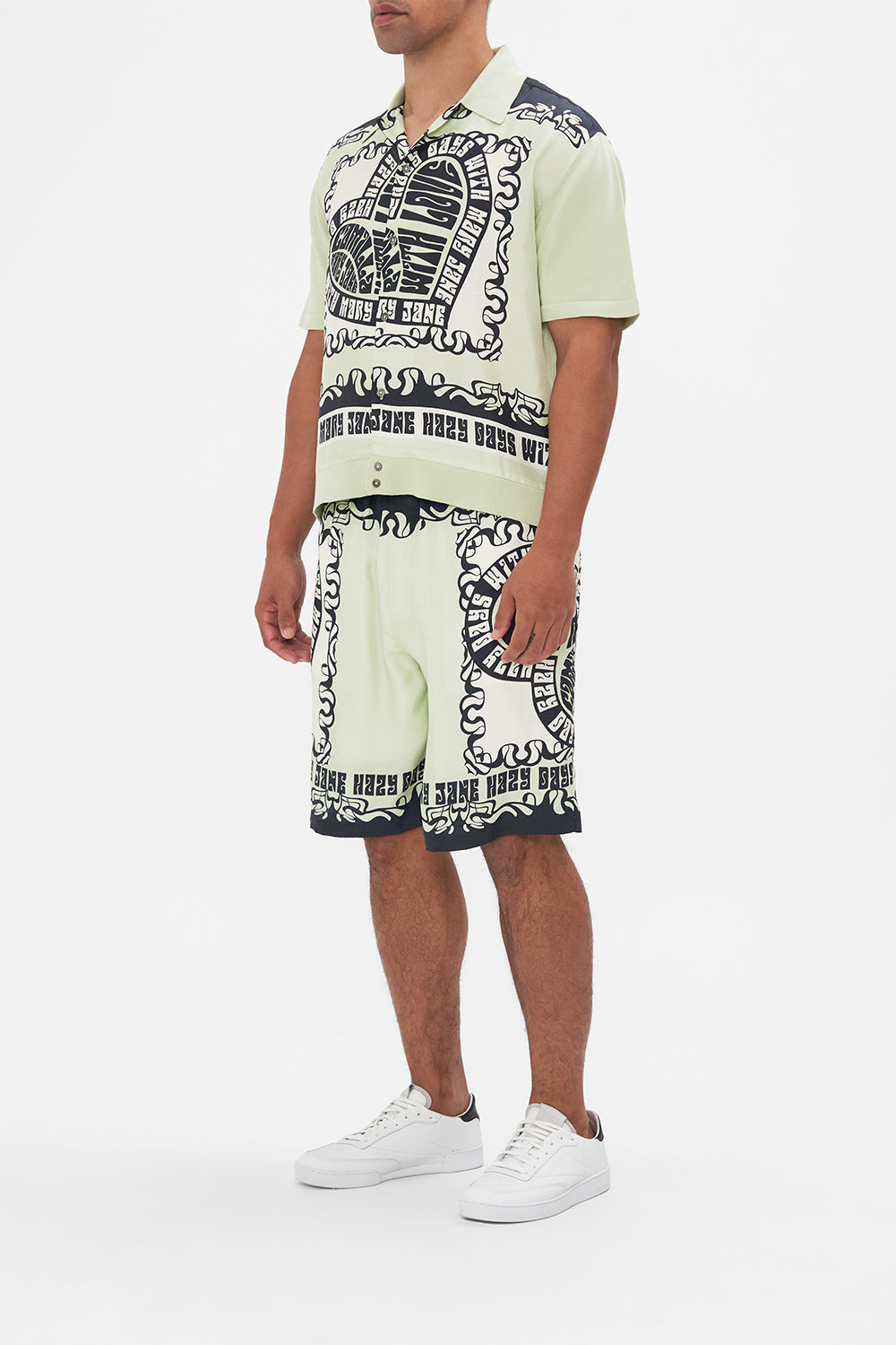 The CAMILLA ELASTIC WAIST BOARDSHORT IF THESE WALLS COULD TALK in our  print.