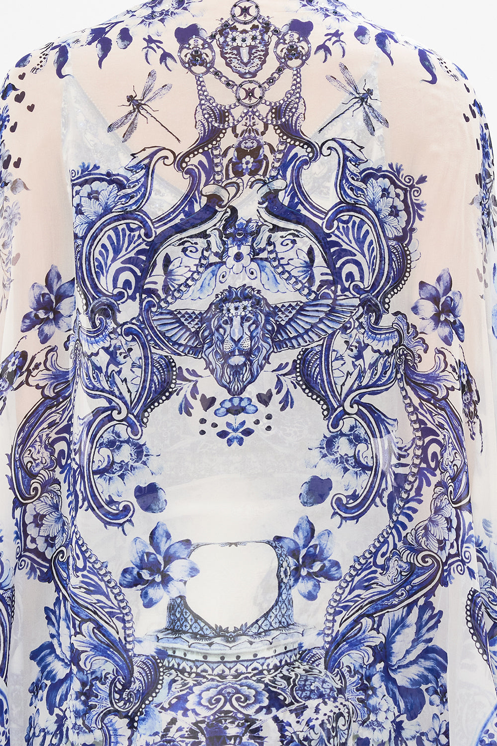 Detail view of model wearing CAMILLA silk shrug in Glaze And Graze print