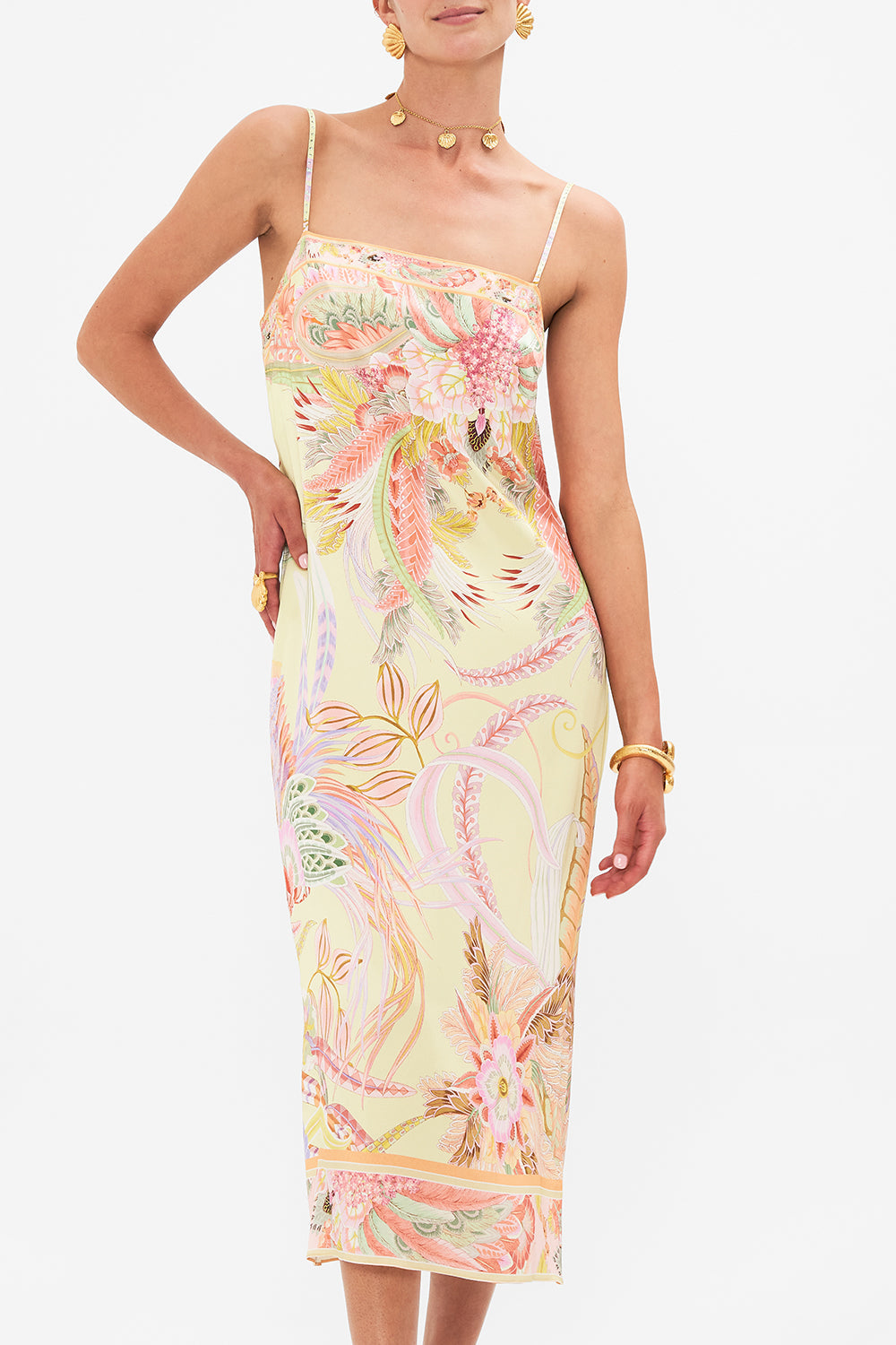 Crop view of model wearing CAMILLA luxury silk dress in Cosmic Tuscan print 