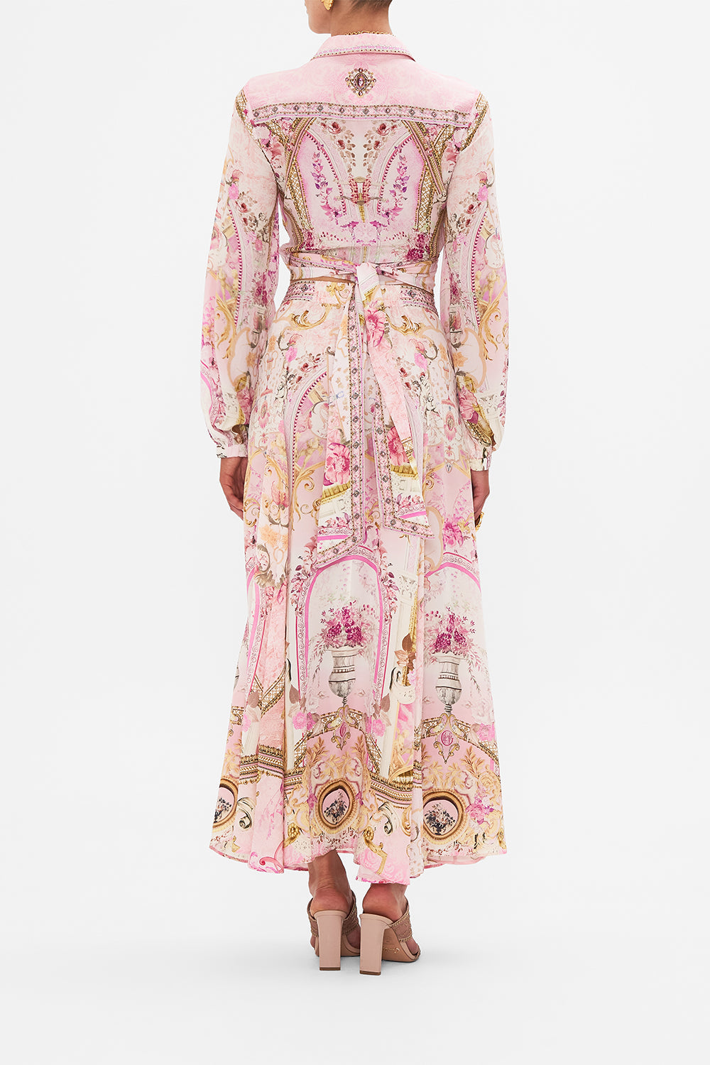Back view of model wearing CAMILLA pink maxi skirt in Fresco Fairytale print
