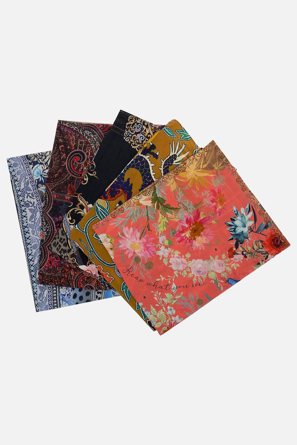 The CAMILLA THROW OVER WITH FEATHERS TILED IN TIME in our  print.