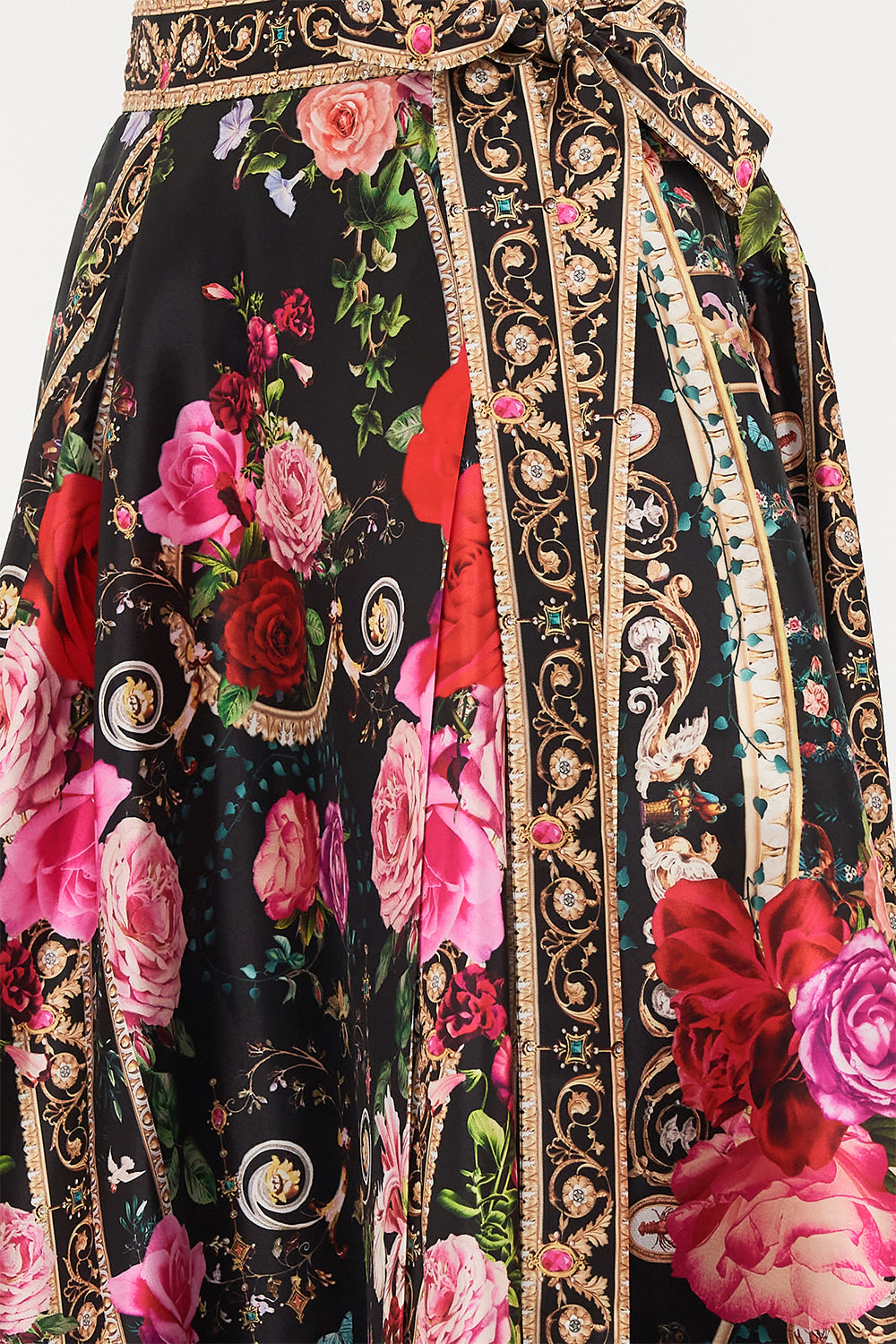 Detail view of model wearing CAMILLA designer maxi wrap skirt in Reservation Fot Love print 