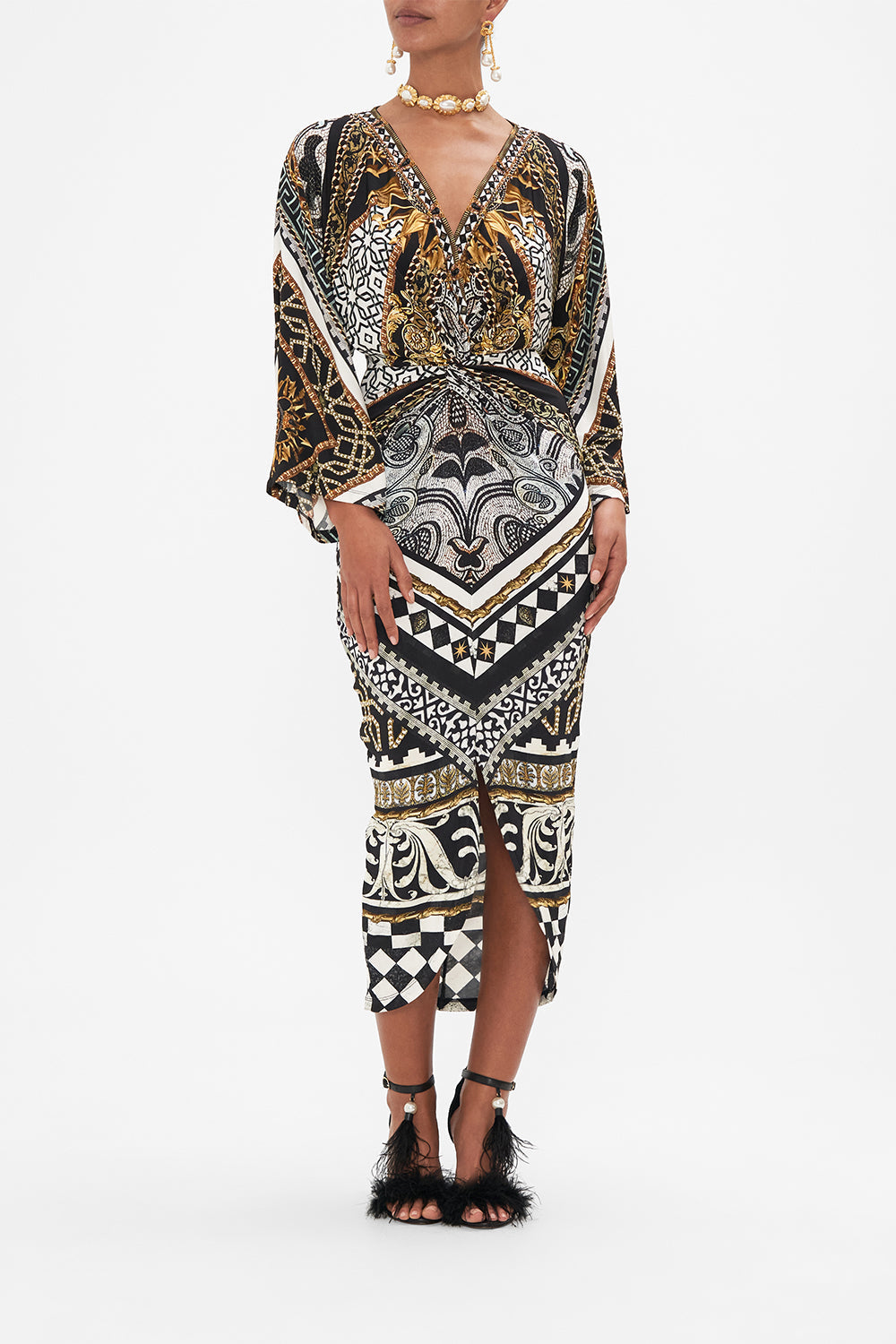 Front view of model wearing CAMILLA black and white midi dress in Look Up Tesoro print