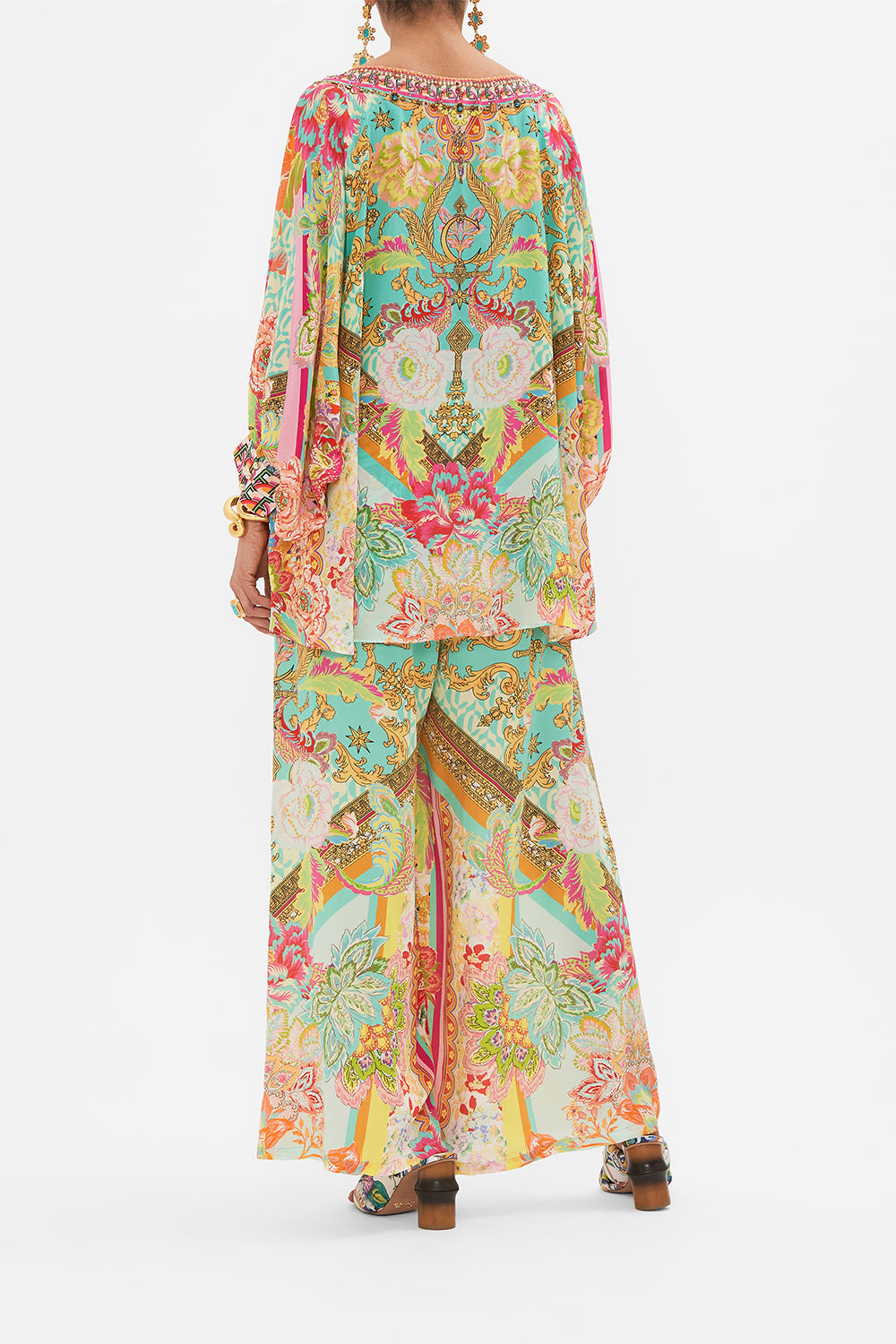 Back view of model wearing CAMILLA printed silk blouse in An Italian Welcome print