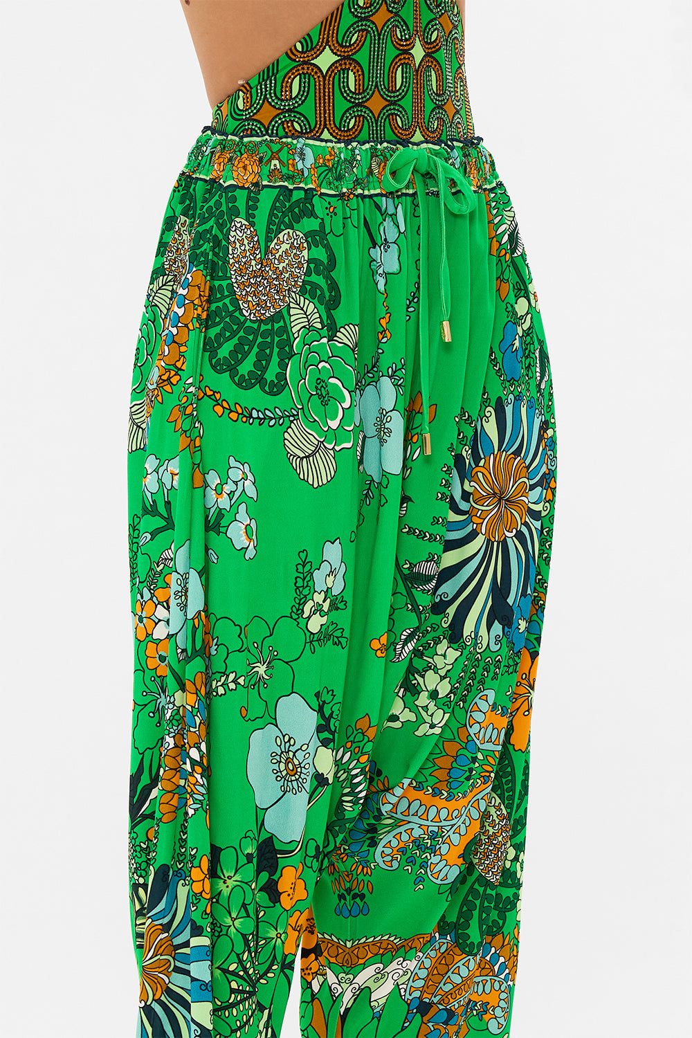 CAMILLA green draped jersey pant in Good Vibes Generation print.