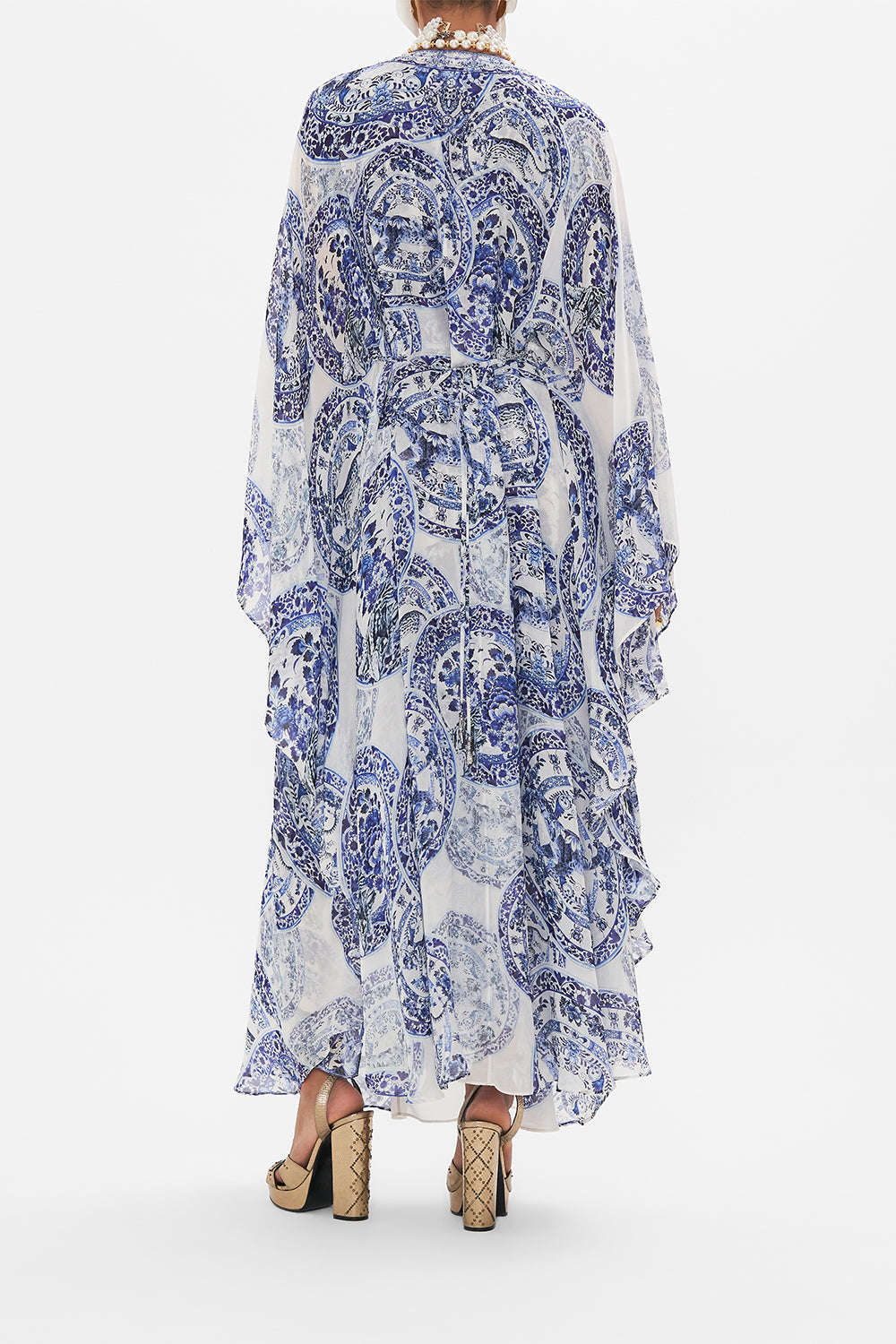 Back view of model wearing CAMILLA silk kaftan in Glaze and Graze print 