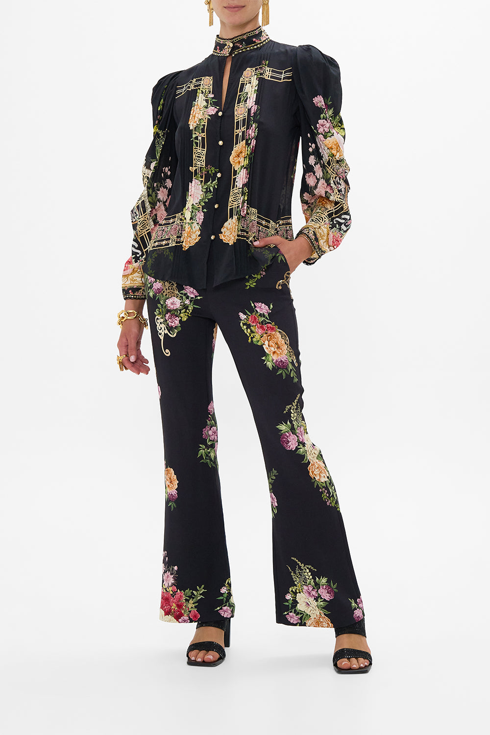 The CAMILLA SLEEVELESS DRAPED T BACK LONG DRESS SAHARA STARLET in our  print.
